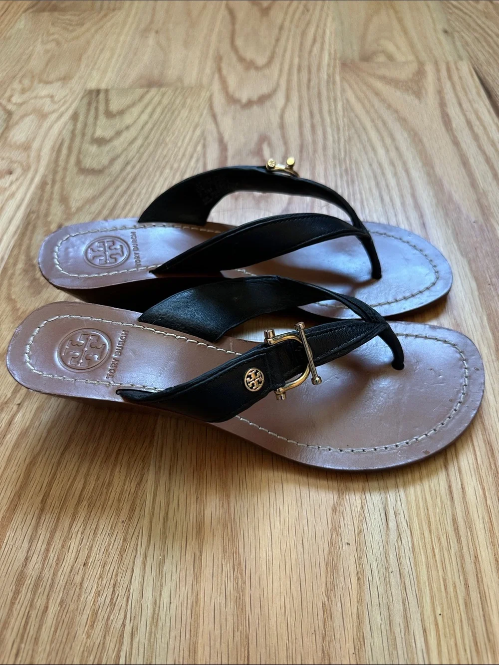 Tory Burch Black Leather Thong Sandals with Gold Logo Accent